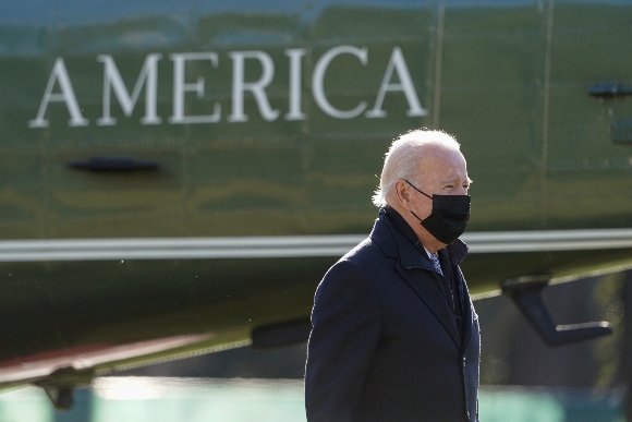 President Joe Biden walks to the Oval Office of the White House after stepping off Marine One