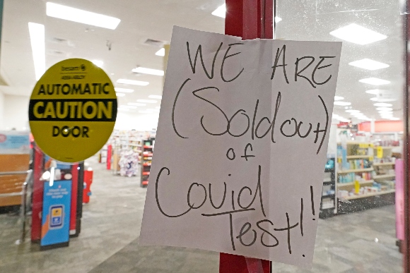 A sign was posted at the front of this CVS pharmacy at the Capitol in Jackson, Miss.