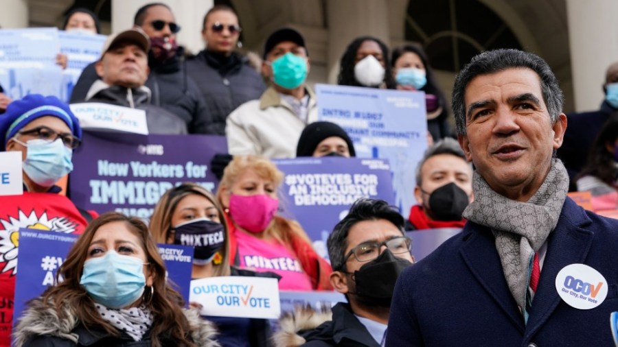 New York City Council Member Ydanis Rodriguez speaks during a rally on the steps of City Hall ahead of a City Council vote to allow lawful permanent residents to cast votes in elections to pick the mayor