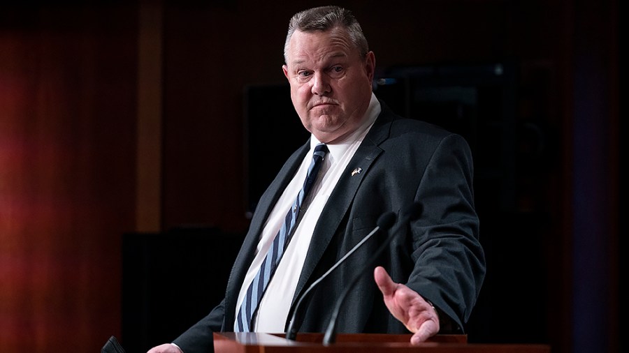 Sen. Jon Tester (D-Mont.) addresses reporters after a virtual weekly policy luncheon on Tuesday, January 11, 2022.