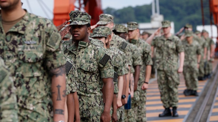 U.S. troops gather on the USS Wasp where U.S. President Donald Trump will deliver Memorial Day remarks to the troops, at the U.S. Military Base in Yokosuka, south of Tokyo, Tuesday, May 28, 2019