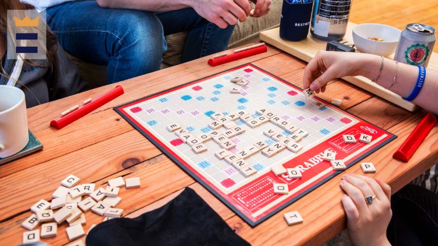 Two people playing the board game Scrabble