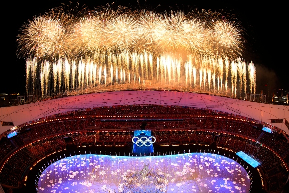 Fireworks light up the sky over Olympic Stadium during the closing ceremony of the 2022 Winter Olympics