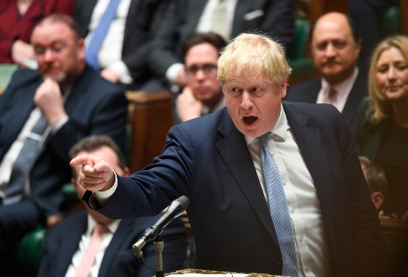 Britain's Prime Minister Boris Johnson speaks in the Houses of Commons