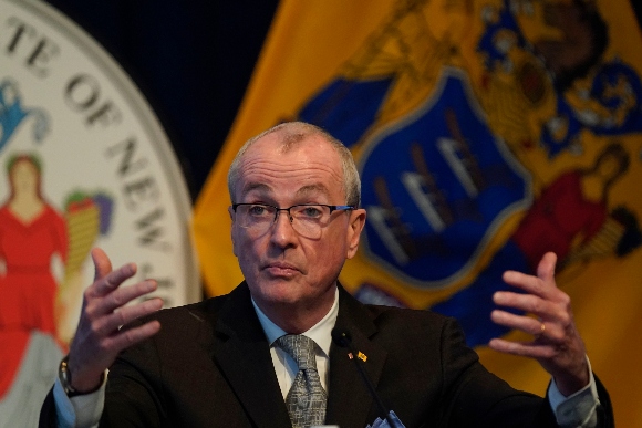 New Jersey Governor Phil Murphy speaks to reporters