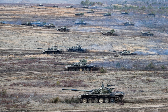 Tanks move during the Union Courage-2022 Russia-Belarus military drills at the Obuz-Lesnovsky training ground in Belarus