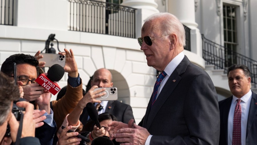 President Joe Biden speaks with reporters before boarding Marine One on the South Lawn of the White House