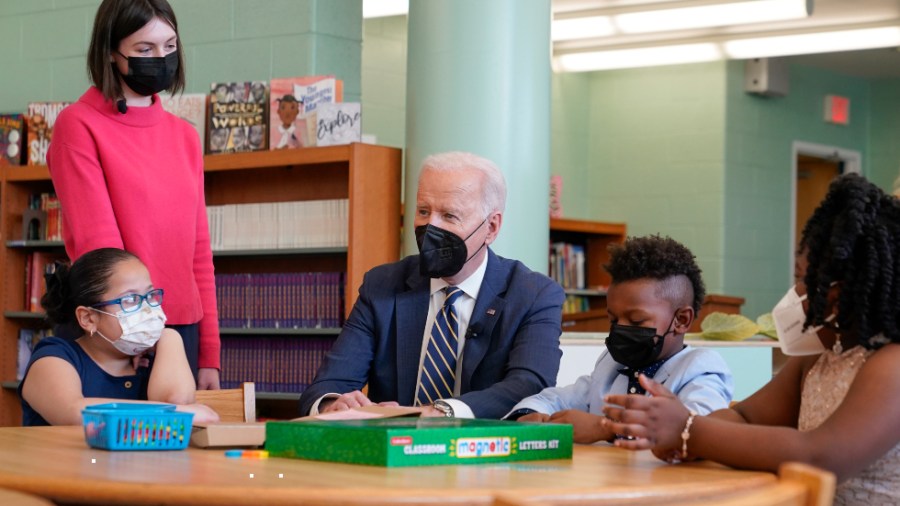 President Biden talks with students during a visit to Luis Muñoz Marin Elementary School in Philadelphia