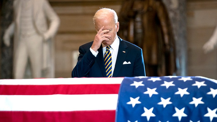 President Joe Biden pays his respects to Rep. Don Young (R-Alaska) as he lies in state in Statuary Hall at the U.S. Capitol in Washington, D.C., on Tuesday, March 29, 2022. Young passed away at the age of 88 serving 49 years in the House and the longest-s