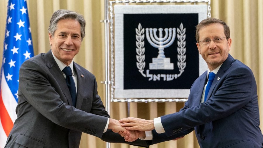 U.S. Secretary of State Antony Blinken, left, and Israel's President Isaac Herzog pose for a photo as they meet at the Presidency