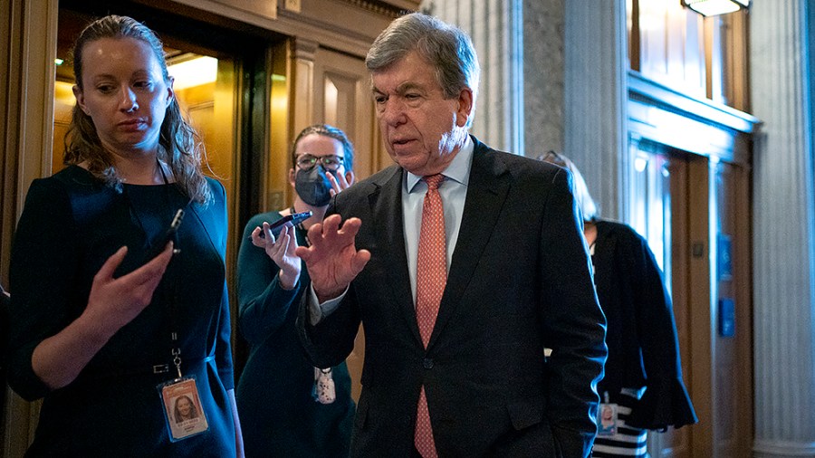 Sen. Roy Blunt (R-Mo.) speaks to reporters as he arrives to the Senate Chamber for the final vote of Shalanda Young to be Director of OMB on Tuesday, March 15, 2022.