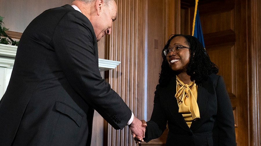 Supreme Court nominee Ketanji Brown Jackson and Majority Leader Charles Schumer (D-N.Y.) participate in a photo op prior to their meeting on Wednesday, March 2, 2022.