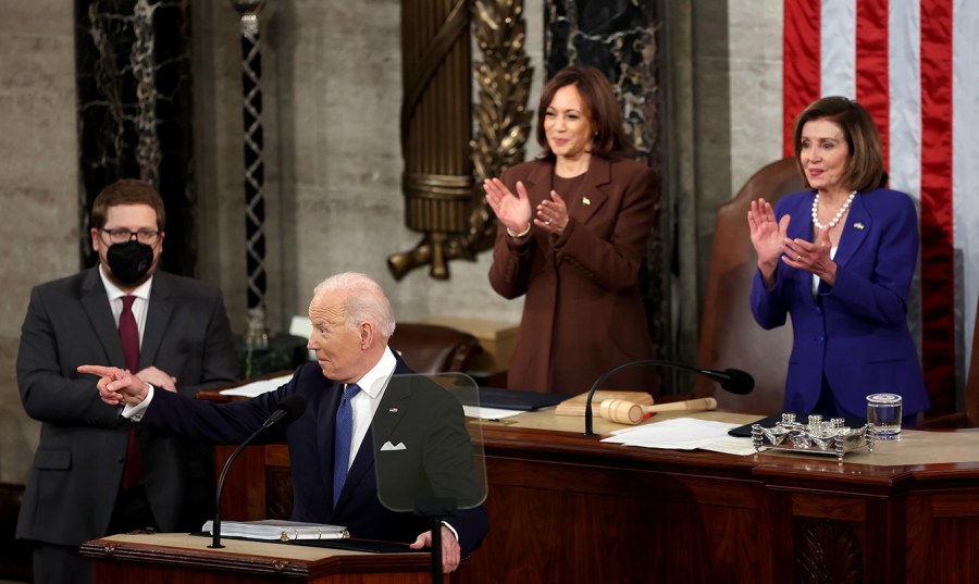 President Biden gives his State of the Union address as Vice President Harris and Speaker Pelosi clap behind him