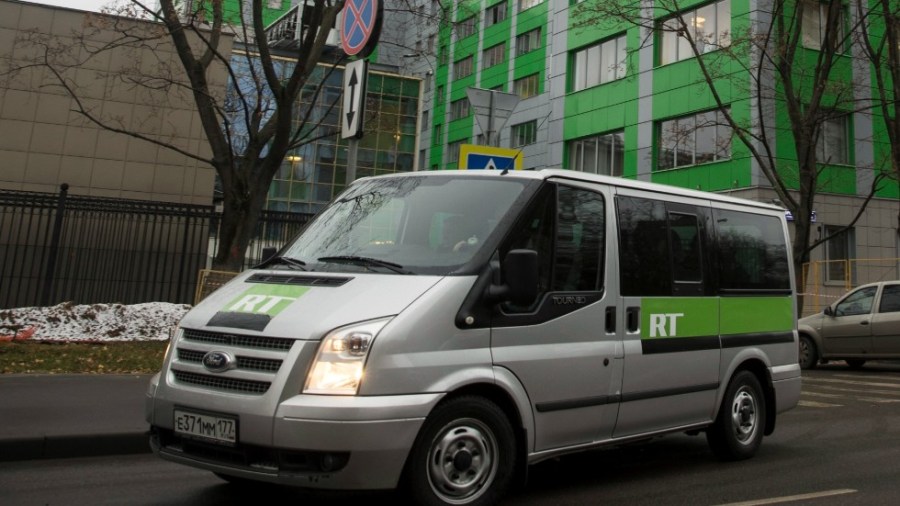 Russian state-owned television station RT passes by the company's office in Moscow