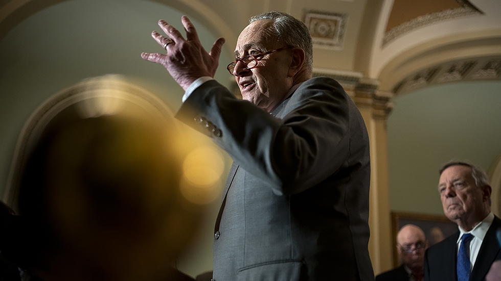 Majority Leader C. Schumer (D-N.Y.) addresses reporters following the weekly policy luncheon on Tuesday, March 8, 2022.