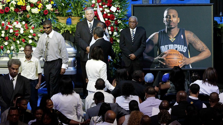 Friends and family of slain NBA basketball player Lorenzen Wright grieve during a memorial service in Memphis, Tenn., in 2010