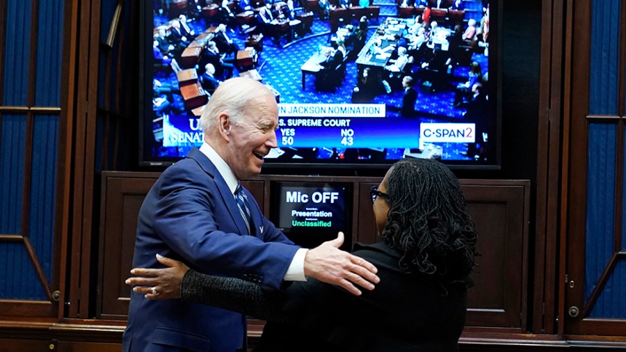 President Biden goes to hug Supreme Court nominee Judge Ketanji Brown Jackson