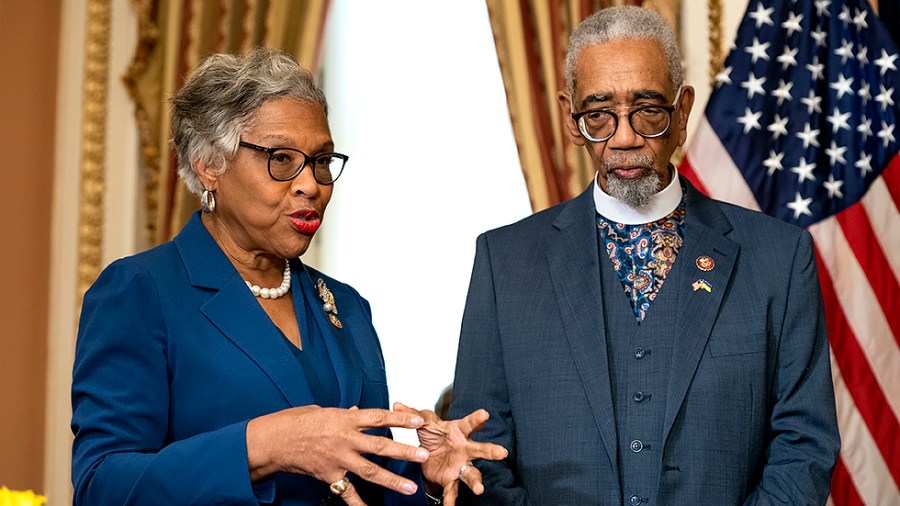 Rep. Joyce Beatty (D-Ohio) speaks to Rep. Bobby Rush (D-Ill.) before an enrollment ceremony of the Emmett Till Antilynching Act on Wednesday, March 16, 2022.