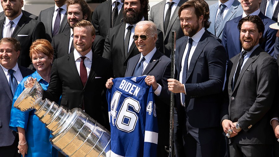 Tampa Bay Lightning Captain Steven Stamkos and Alternate Captain Victor Headman present a jersey and silver hockey stick to President Biden at the White House on Monday, April 25, 2022, celebrating their 2020 and 2021 Stanley Cup Championship wins.