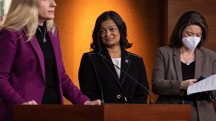 Rep. Pramila Jayapal (D-Wash.) listens as Rep. Abigail Spanberger (D-Va.) speaks to reporters about the ethical concerns of members’ of Congress stock trading practices during a press conference on Capitol Hill in Washington, D.C., on Thursday, April 7, 2022.