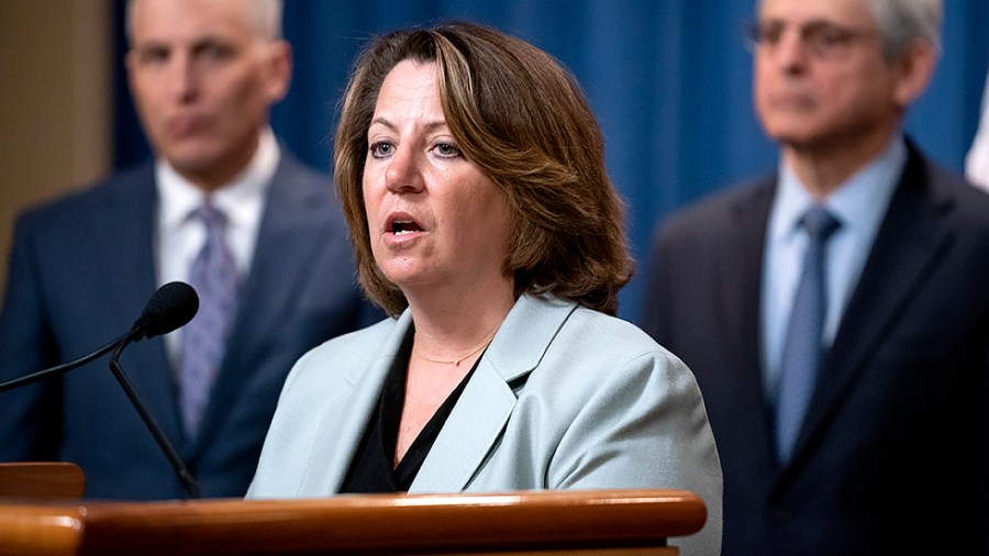 Deputy Attorney General Lisa Monaco addresses reporters during a press conference on Wednesday, April 6, 2022 at the Department of Justice in Washington, D.C., to announce enforcement actions over criminal Russian activity involving crypto currency.