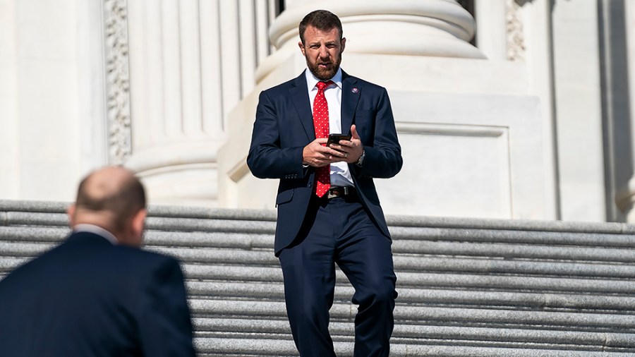 Rep. Markwayne Mullin (R-Okla.) leaves the House Chamber following the final vote of the week regarding the Creating a Respectful and Open World for Natural Hair Act on Friday, March 18, 2022.