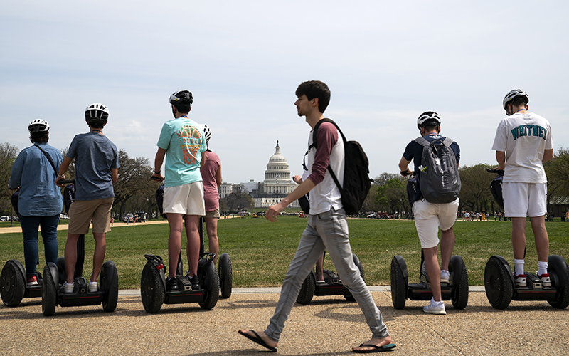 Tourists riding Segways are seen at the National Mall