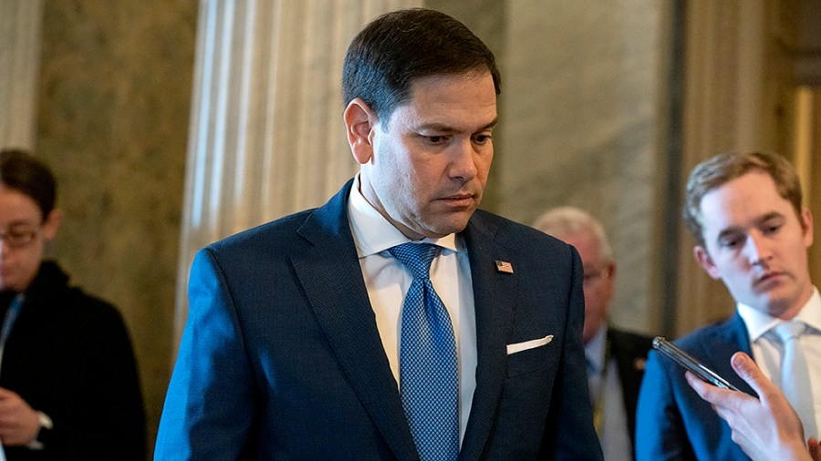 Sen. Marco Rubio (R-Fla.) speaks to a reporter before heading into the Senate Chamber a procedural vote regarding the nomination of Alvaro Bedoya to be a Federal Trade Commissioner on Wednesday, March 30, 2022.