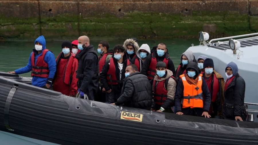 A group of people thought to be migrants are brought in to Dover, Kent, onboard a Border Force vessel following a small boat incident in the Channel