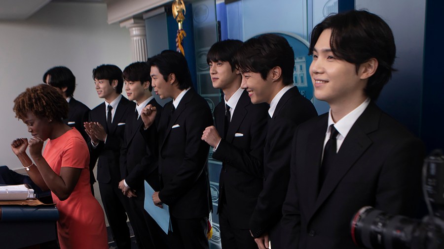 Members of the K-pop supergroup BTS from left, V, Jungkook, Jimin, RM, Jin, J-Hope, and Suga join White House press secretary Karine Jean-Pierre during the daily briefing at the White House in Washington, D.C. on Tuesday, May 31, 2022.