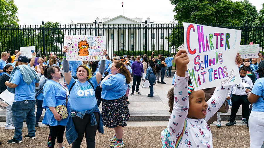 Students, parents and educators with National Alliance for Public Charter Schools hold a rally outside the White House on Wednesday, May 11, 2022 as the Biden administration is proposing tougher regulations for charter schools to receive funding.