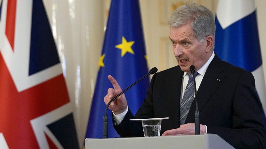 Finland's President Sauli Niinisto makes a point during a joint press conference with British Prime Minister Boris Johnson in Helsinki.