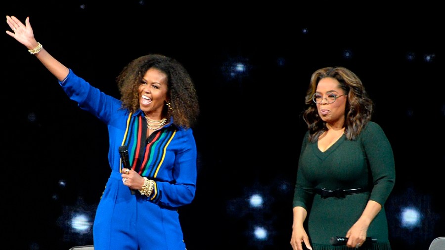 Michelle Obama and Oprah Winfrey participate in the "Oprah's 2020 Vision: Your Life in Focus" tour in 2020.