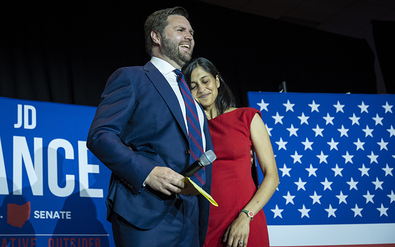 U.S. Senate candidate J.D. Vance embraces his wife, Usha Vance