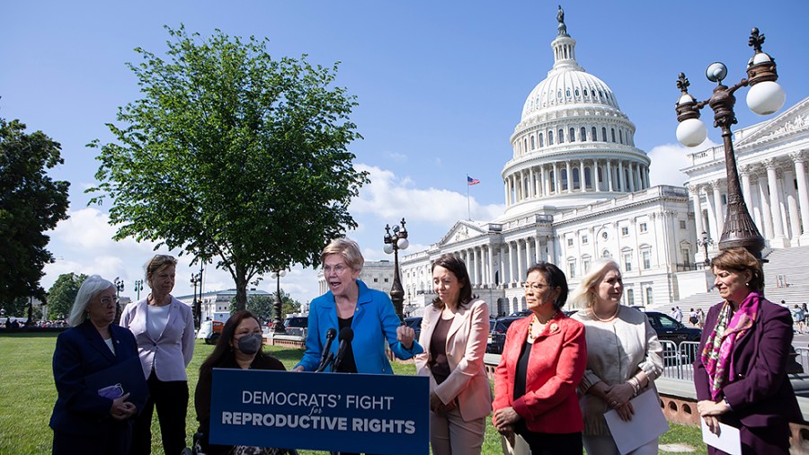 Sen. Elizabeth Warren (D-Mass.) addresses reporters during a press conference of Democratic women Senators on their continued fight to protect abortion rights on Capitol Hill in Washington, D.C., on Thursday, May 19, 2022.