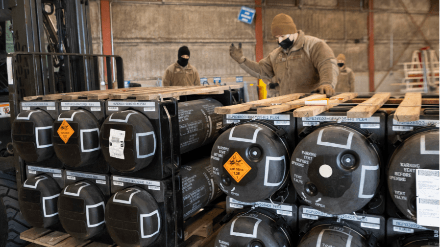 FILE - In this image provided by the U.S. Air Force, Airmen and civilians from the 436th Aerial Port Squadron palletize ammunition, weapons and other equipment bound for Ukraine during a foreign military sales mission at Dover Air Force Base, Del., on Jan. 21, 2022.