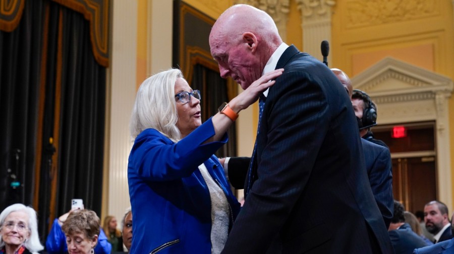 Vice chair Rep. Liz Cheney, R-Wyo., hugs Rusty Bowers, Arizona state House Speaker, during a break