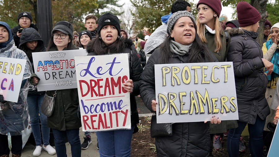 Protests in favor of the Deferred Action for Childhood Arrivals program demonstrate outside the Supreme Court as the court hears several cases regarding the DACA program on Tuesday, November 12, 2019.