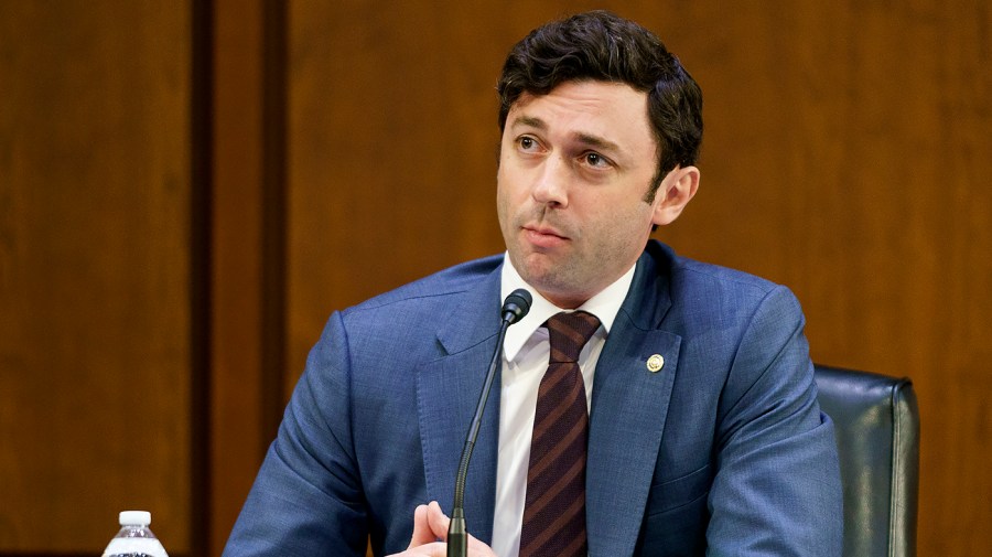 Sen. Jon Ossoff (D-Ga.) questions Federal Reserve Chairman Jerome Powell during a Senate Banking, Housing, and Urban Affairs Committee hearing for the Semiannual Monetary Policy Report to Congress on Wednesday, June 22, 2022.