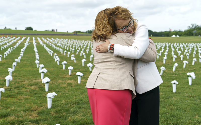 Gabrielle Giffords hugs Lucy McBath 