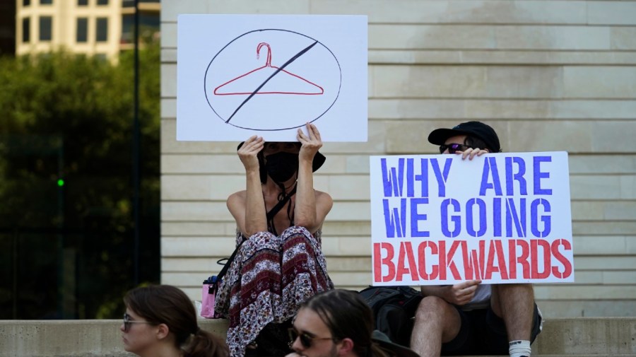 FILE - Demonstrators gather at the federal courthouse following the Supreme Court's decision to overturn Roe v. Wade, June 24, 2022, in Austin, Texas. Some opponents of the decision are feeling despair over the historic rollback of the 1973 case Roe V. Wade legalizing abortion.