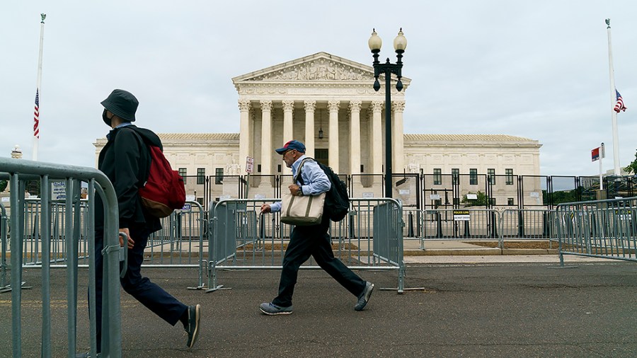 The Supreme Court is seen with extra barriers on Wednesday, May 25, 2022 in preparation for a ruling in Whole Women's Health v. Jackson which could strike Roe v. Wade. The court has until the end of June before their annual summer break to announce decisions.