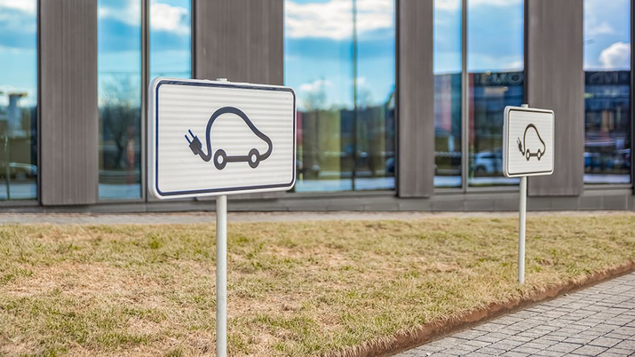 Parking space for an electric car. Parking sign. Incentives for electric vehicles.