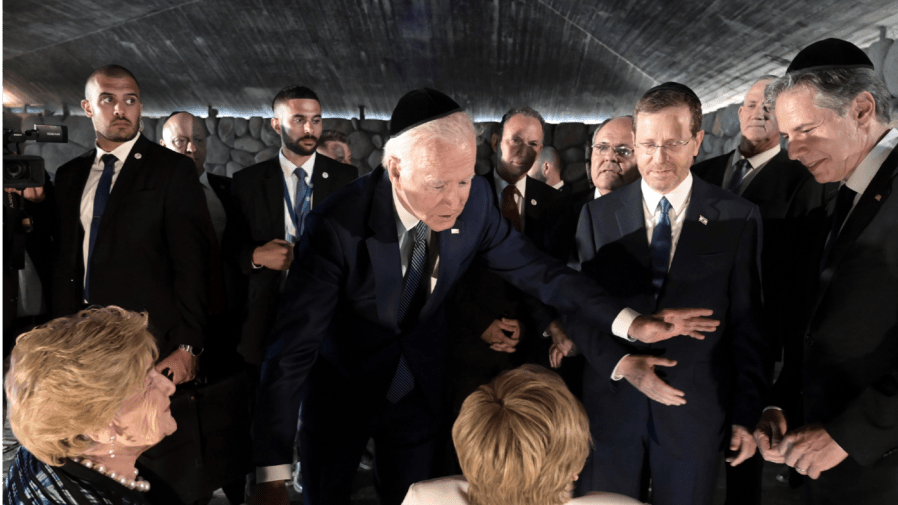 U.S. President Joe Biden greets Holocaust survivors, Rena Quint and Gita Cycowicz, in the Hall of Remembrance at Yad Vashem, the World Holocaust Remembrance Center, in Jerusalem, on Wednesday, July 13, 2022.