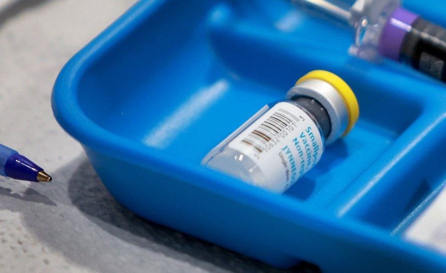 vial of smallpox vaccine in a blue tray