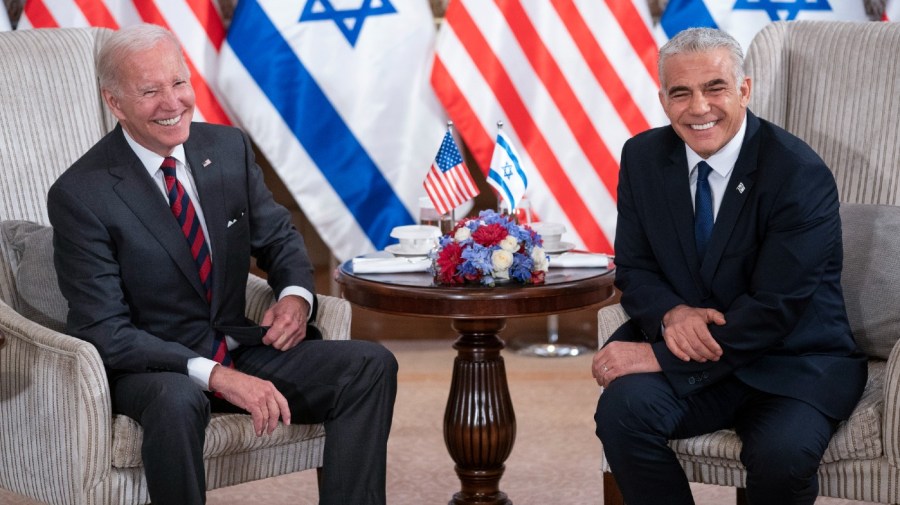 President Joe Biden, left, and Israeli Prime Minister Yair Lapid address the media following their meeting in Jerusalem.