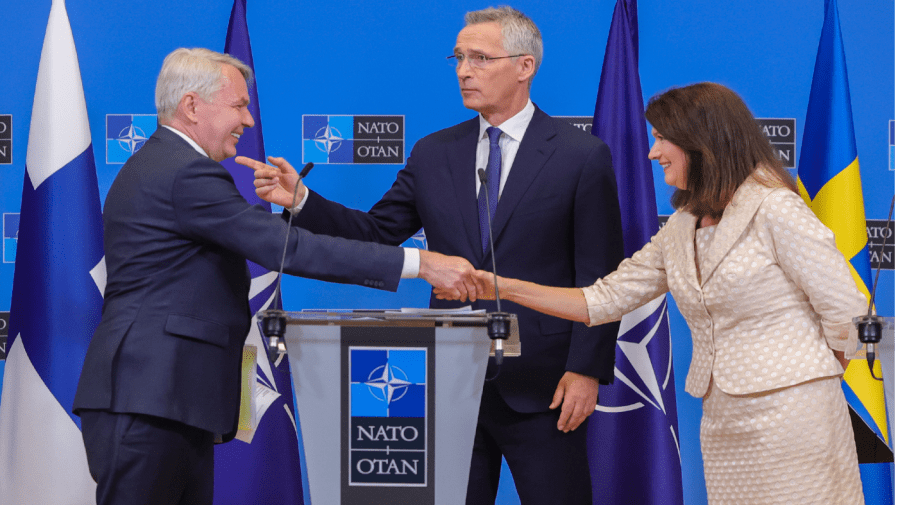 Finland's Foreign Minister Pekka Haavisto, left, Sweden's Foreign Minister Ann Linde, right, and NATO Secretary General Jens Stoltenberg attend a media conference after the signature of the NATO Accession Protocols for Finland and Sweden in the NATO headquarters in Brussels, Tuesday, July 5, 2022.