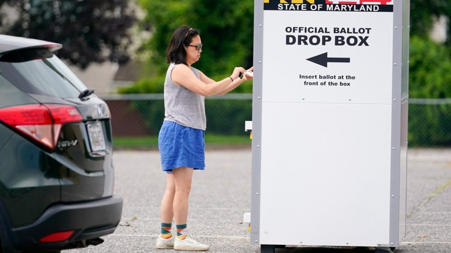 Woman voting in Maryland