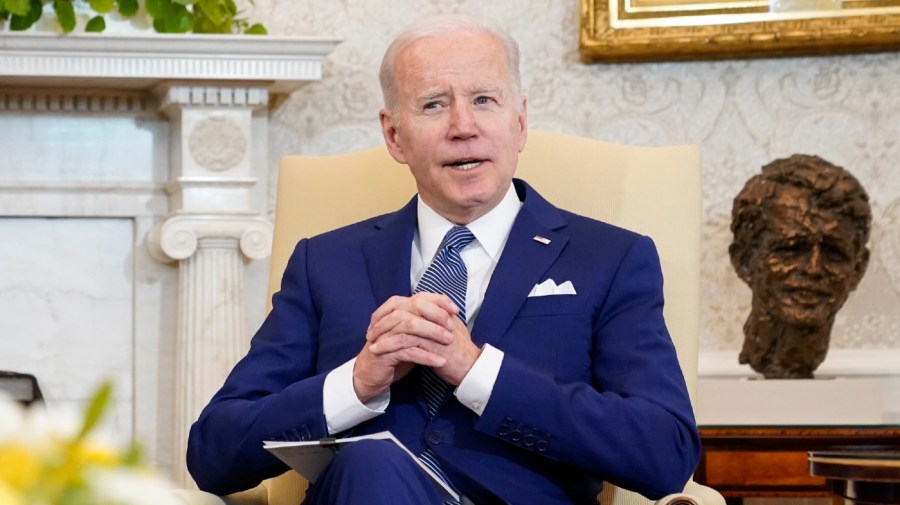 FILE - President Joe Biden sits in the Oval Office of the White House, on March 4, 2022, in Washington.