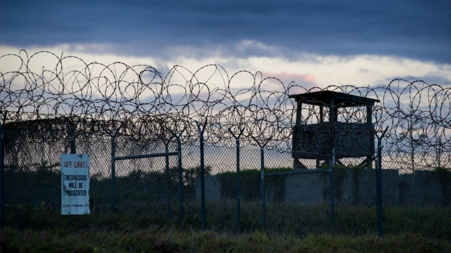 The sun sets behind the Guantanamo Bay Naval Base, Cuba.